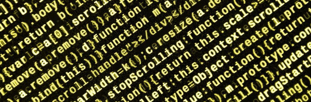 Big data and Internet of things trend. IT specialist workplace. Website HTML Code on the Laptop Display Closeup Photo. Big data storage and cloud computing representation